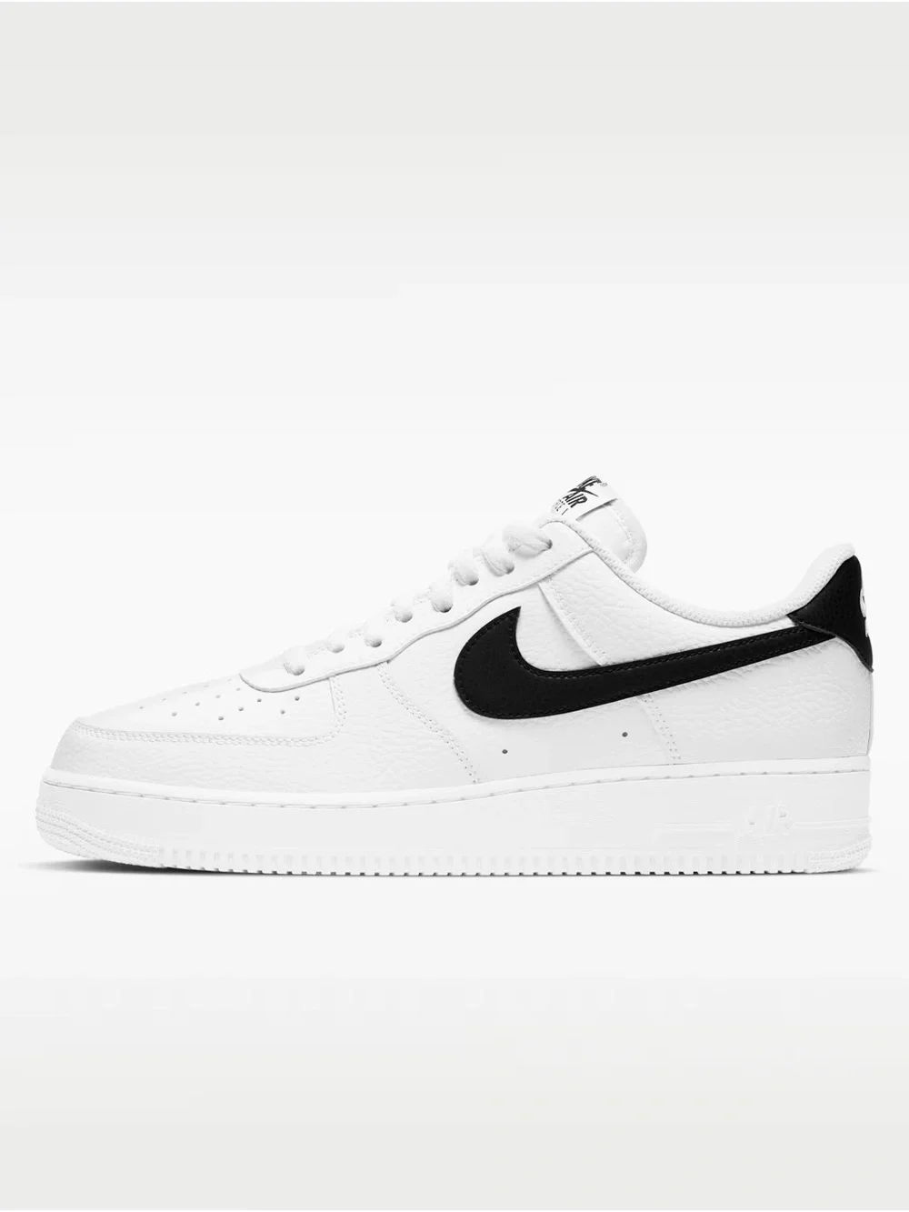 Nike White Leather Low-Top Sneakers with Black Swoosh
